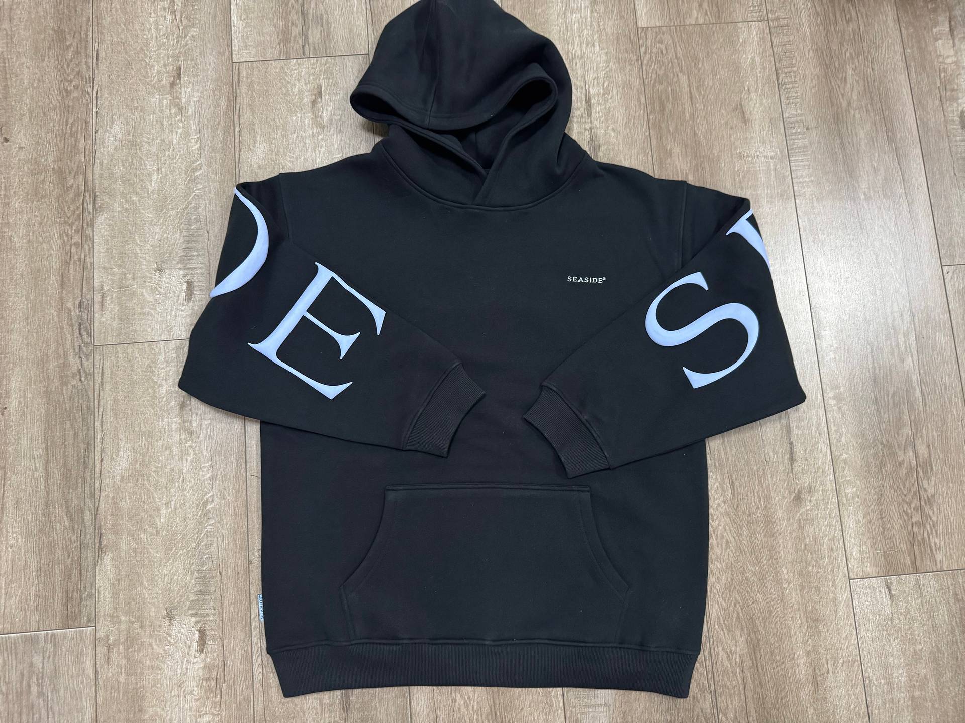 Custom Dark Pullover Hoodie with Oversized Sleeve Graphics